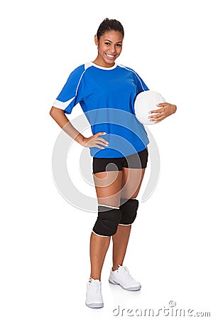 Young Girl Holding Volleyball Stock Photo