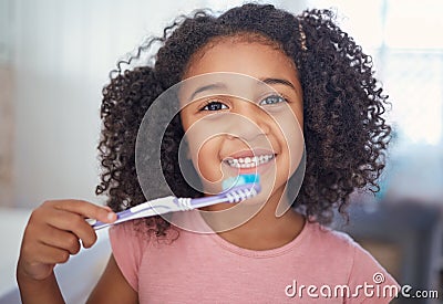 Young girl kids, portrait and brushing teeth, dental healthcare and bathroom toothbrush in Brazil home. Happy, smile and Stock Photo