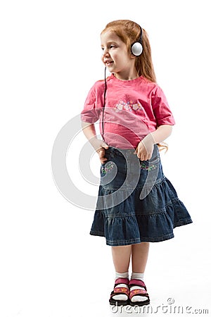 Young girl listening to music in head phones Stock Photo