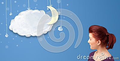 Young girl looking at cartoon night clouds with moon Stock Photo