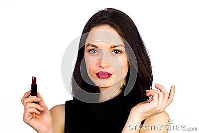 Young girl makes a make-up Stock Photo