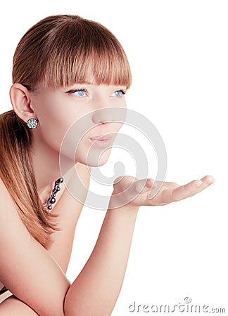Young girl making blow kiss Stock Photo