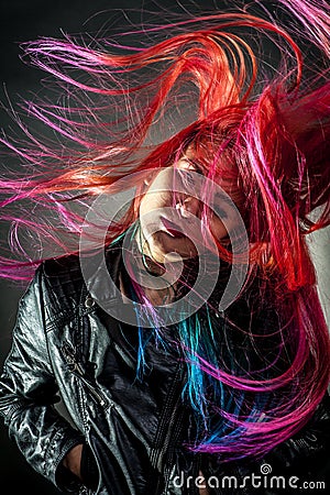 Young girl movement colour hair magnificent Stock Photo