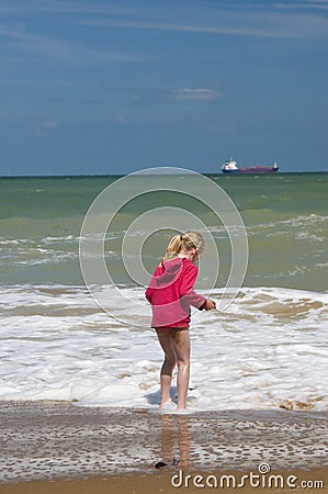 Young girl paddling Stock Photo