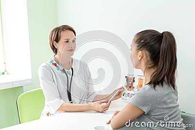 Young girl patient examined by a general practitioner Stock Photo