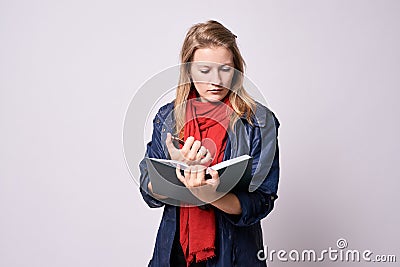 Young girl. Planning affairs. Notepad entries Stock Photo