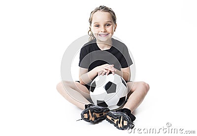 Young girl play soccer ball, Isolated over white Stock Photo