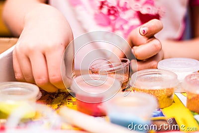 Young girl playing and making handmade art Stock Photo