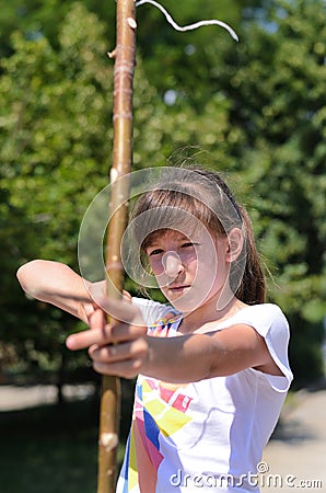 Young girl practising her archery Stock Photo