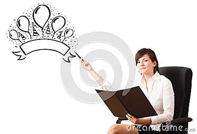 Young girl presenting a party label on whiteboard Stock Photo