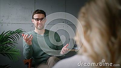 Young girl at the reception of a professional psychotherapist Stock Photo