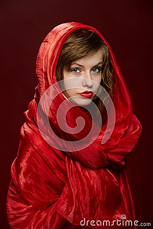 Young girl in a red hood Stock Photo