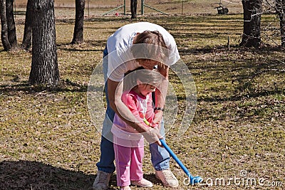 Young Girl's Golf Lesson Stock Photo