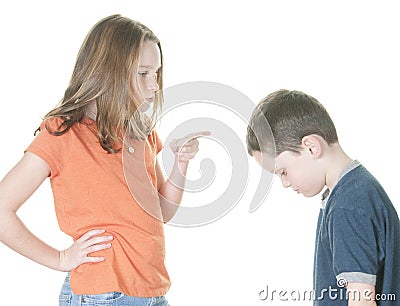 Young girl scolding boy Stock Photo