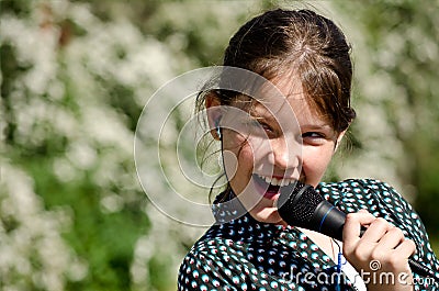 Young girl singing Stock Photo