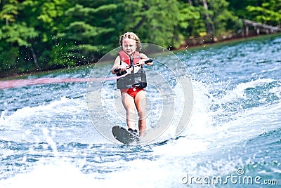 Young Girl on Slalom Ski Stock Photo