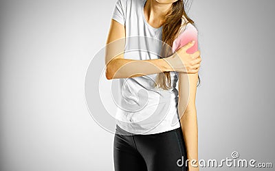 A young girl sore arm. The pain in my arm. The location of the p Stock Photo