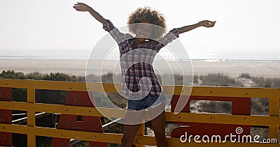 Young Girl Spreading Hands And Joy Stock Photo