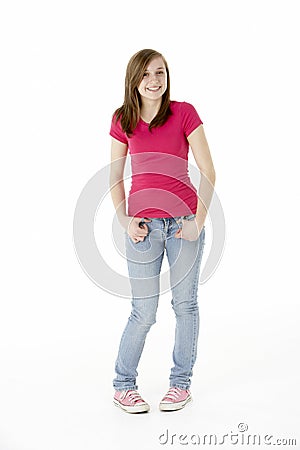 Young Girl Standing In Studio Stock Photo