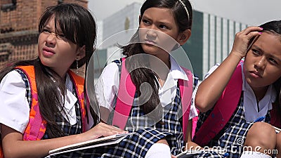 Young Girl Students And Confusion Wearing School Uniforms Stock Photo