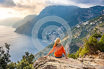 Young girl on Positano coast background, Amalfi, Italy Stock Photo