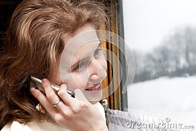 Young girl takling by phone Stock Photo