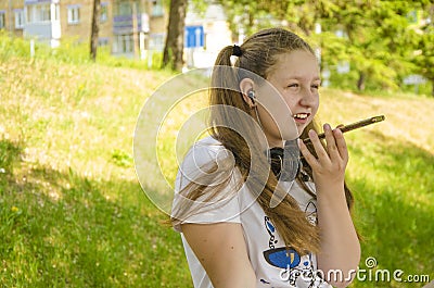 A young girl talking on the phone Stock Photo