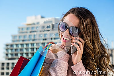 Young girl telephone during shopping Stock Photo