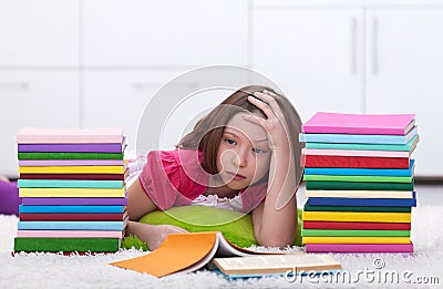 Young girl tired learning Stock Photo