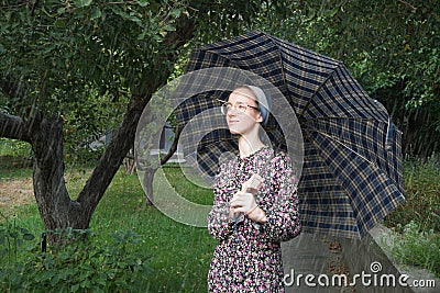 Young girl with an umbrella Stock Photo