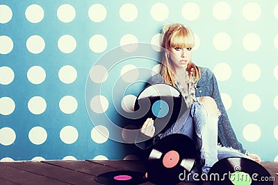 Young girl with vinyl records in the hands Stock Photo