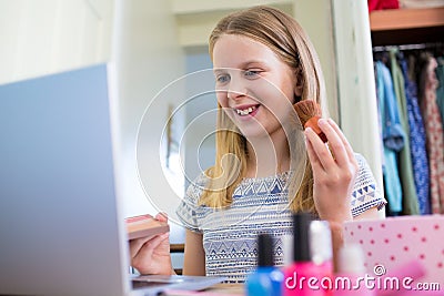 Young Girl Watching On Line Make Up Tutorial Stock Photo