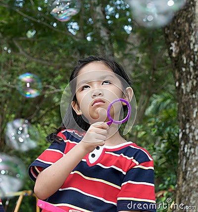 Young girl with weird expression Stock Photo