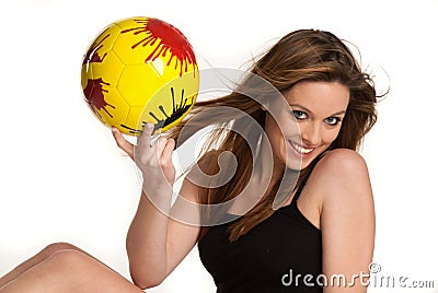 Young girl with a yellow ball Stock Photo