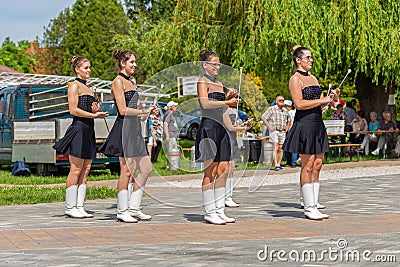 Young girls dancing in a majorette group in event in small village, Vonyarcvashegy in Hungary. 05. 01. 02018 HUNGARY Editorial Stock Photo
