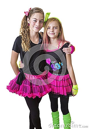 Young girls dressed in retro 80s clothing isolated on a white background Stock Photo