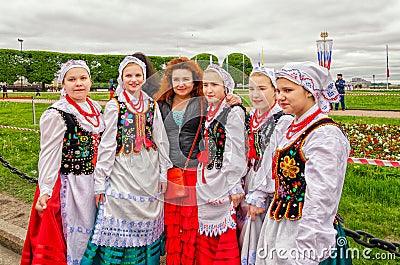 Young girls the member of the Polish folk dance ensemble GAIK. Editorial Stock Photo