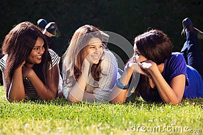 Young Girls Relaxing Outdoors Stock Photo