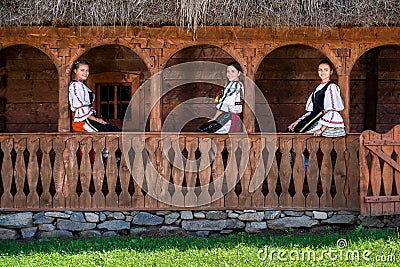 Young girls with Romanian traditional costume Editorial Stock Photo