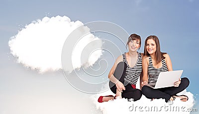 Young girls sitting on cloud and thinking of abstract speech bub Stock Photo