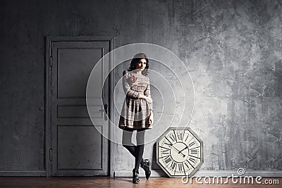 Young and graceful woman posing in an ancient interior Stock Photo