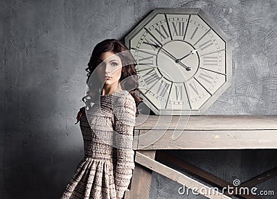 Young and graceful woman posing in ancient interior Stock Photo