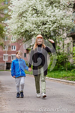 Young grandmother and six-year-old grandson Stock Photo
