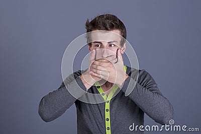 Young guy shut your mouth Stock Photo