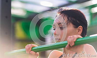 Young gymnast concentrating on her workout Stock Photo