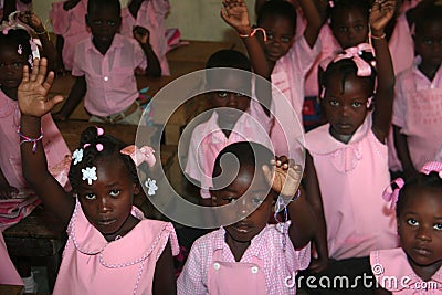 Young Haitian school girls and boys in classroom at school. Editorial Stock Photo