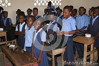 Young Haitian school girls and boys singing in classroom at school. Editorial Stock Photo