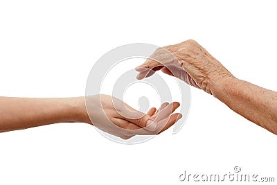 Young hand holding and elder one Stock Photo