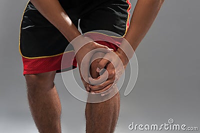 Young handsome African basketball player feeling Stock Photo