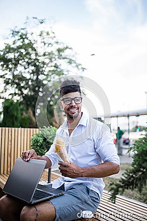 Young business man on city street Stock Photo